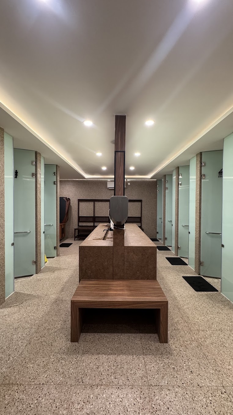 Modern bathroom with dual vanity sinks at BSD facility