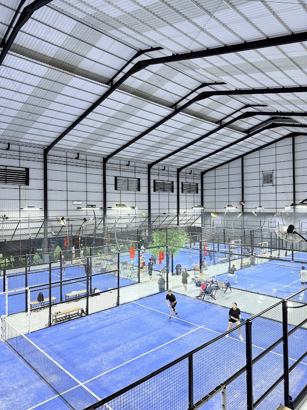 Panoramic view of multiple courts from mezzanine level at BSD