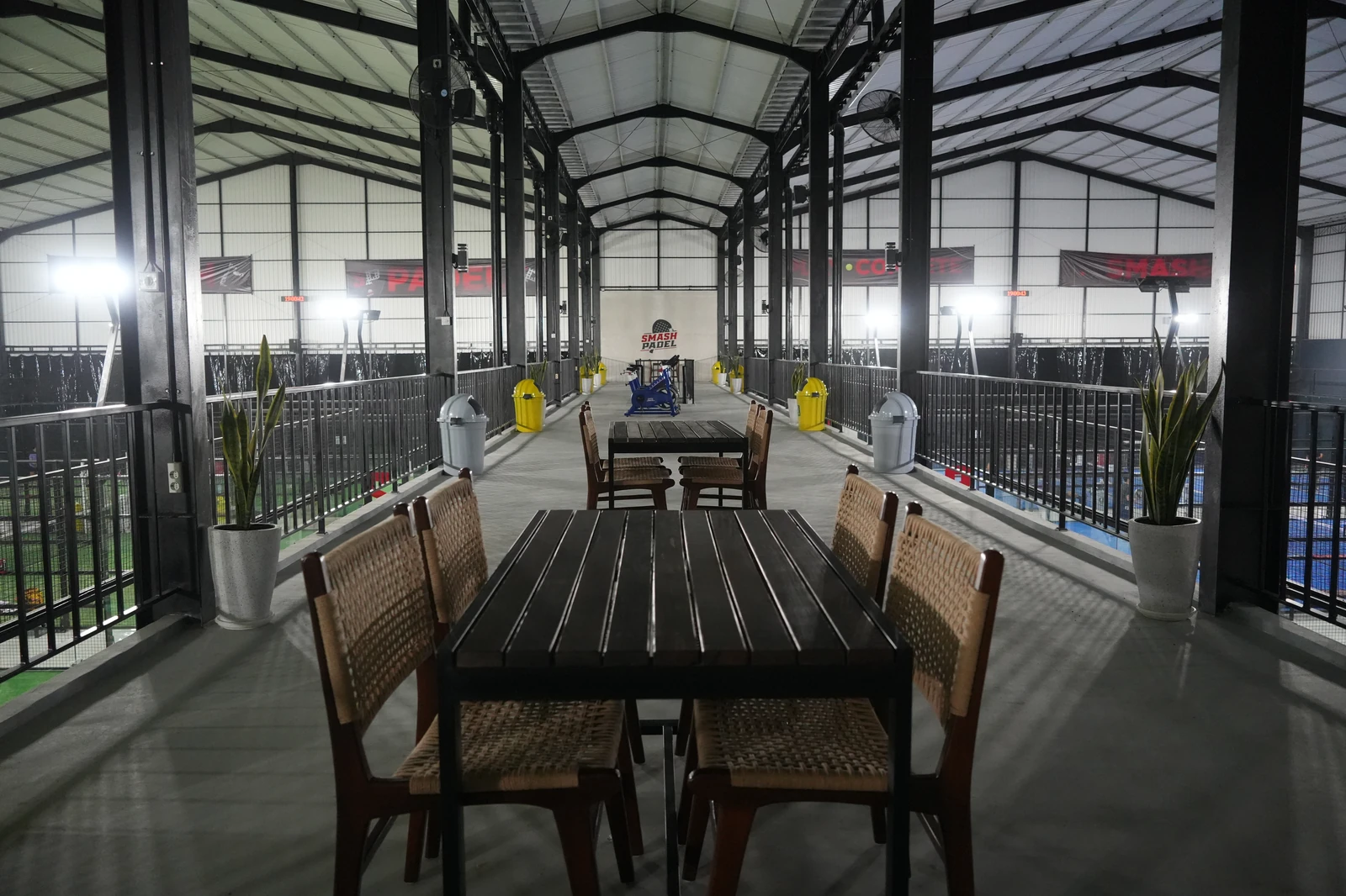 Comfortable mezzanine seating area overlooking the courts